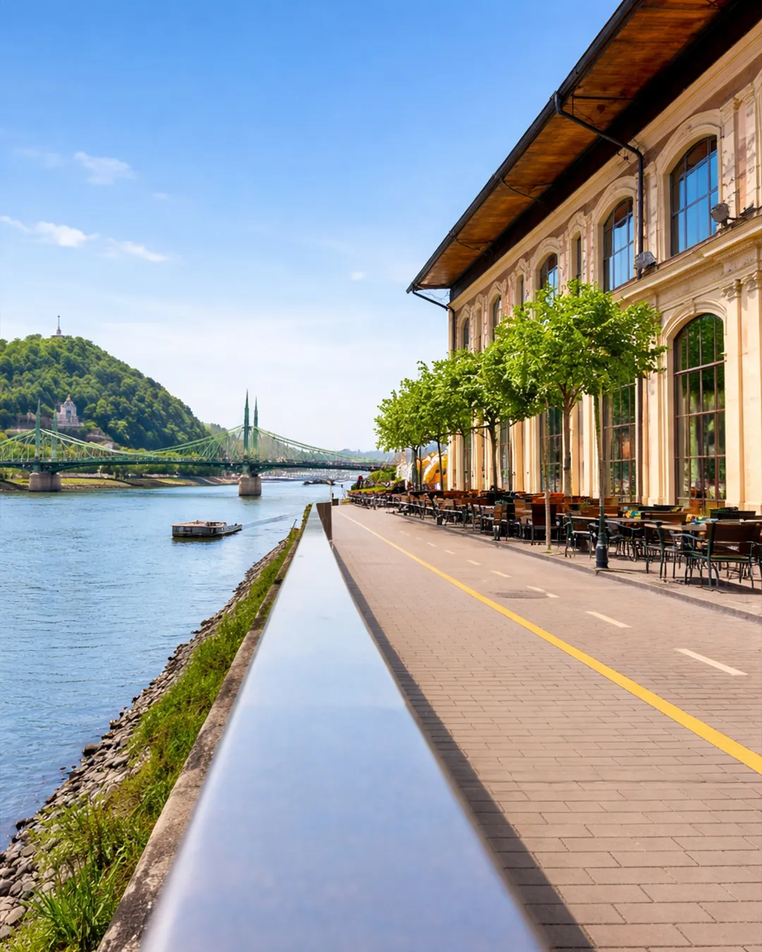 Danube view restaurant in Budapest on the day with riverside terrace atmosphere